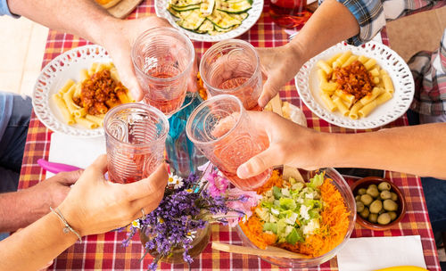 High angle view of people holding food