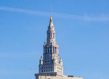 Low angle view of building against blue sky
