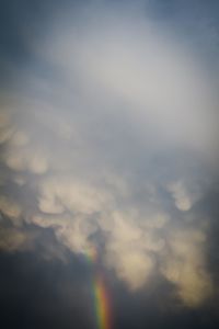 Low angle view of rainbow in sky