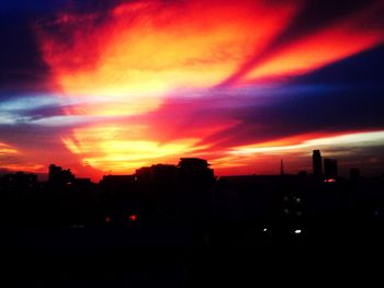 Silhouette of buildings at sunset