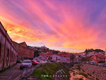 Panoramic view of buildings against sky during sunset