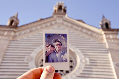 Photo in front of church against sky