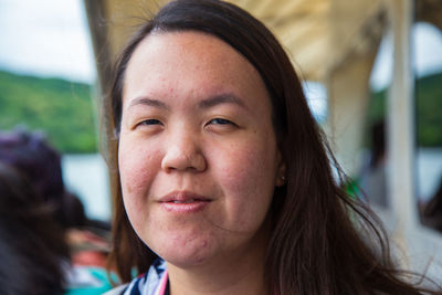 Close-up portrait of mid adult woman