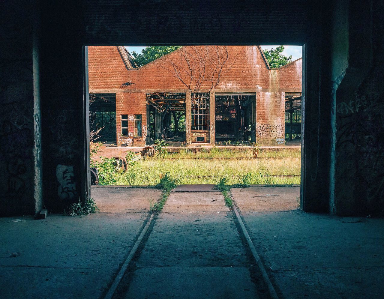 architecture, building exterior, built structure, street, road, window, sidewalk, day, outdoors, door, house, no people, the way forward, wall - building feature, closed, empty, shadow, transportation, footpath, sunlight