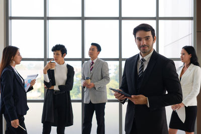 Group of people looking at camera