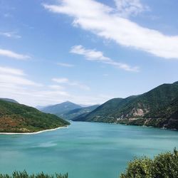 View of lake against cloudy sky