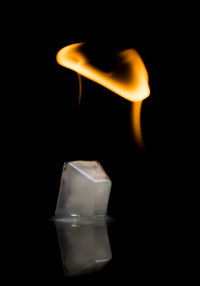 Close-up of ice cream over black background