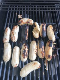High angle view of meat on barbecue grill