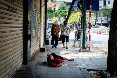 A homeless person in an old quarter in hanoi