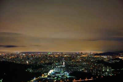 Aerial view of illuminated cityscape