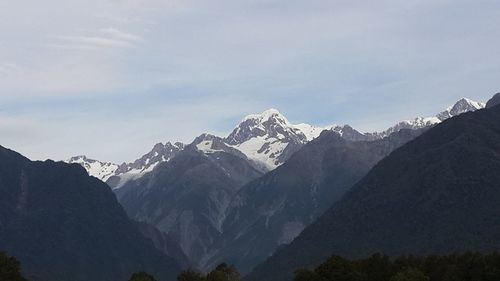 Scenic view of snow covered mountains