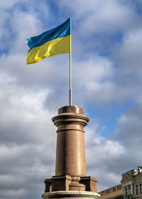 Ukrainian flag on the site of the former monument to catherine the great in odessa, ukraine
