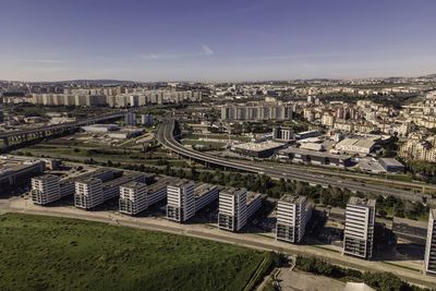 High angle view of street amidst buildings in city