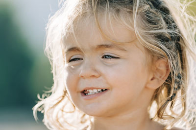 Close-up portrait of smiling girl