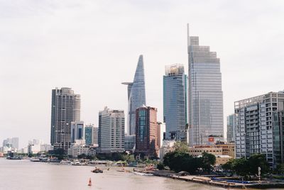 Buildings in city against sky