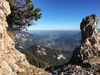 Scenic view of mountains against clear blue sky