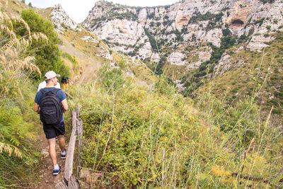 Full length of man walking on mountain