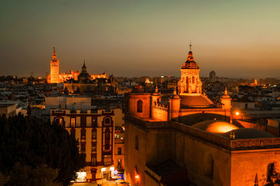 High angle view of illuminated buildings in city seville