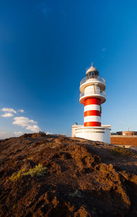 Low angle view of lighthouse against sky