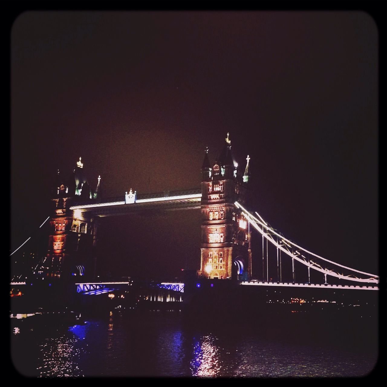 architecture, built structure, bridge - man made structure, connection, illuminated, engineering, night, transfer print, water, suspension bridge, river, bridge, travel destinations, international landmark, famous place, auto post production filter, sky, tourism, waterfront, travel