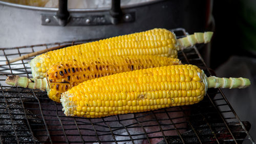 Close-up of yellow meat on barbecue grill