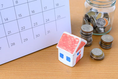High angle view of coins on table