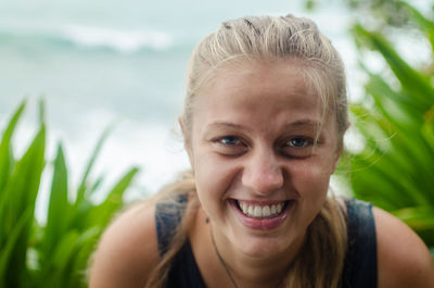 Portrait of smiling young woman outdoors