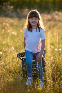 Portrait of girl on field