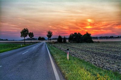 Empty road at sunset