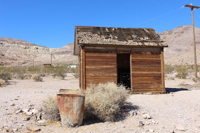 Old abandoned building against clear sky