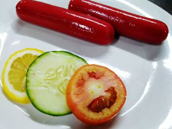 High angle view of vegetables in plate on table