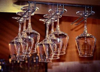 Close-up of wine glasses on table