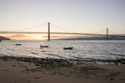 View of suspension bridge over sea