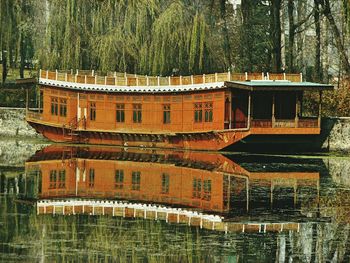 Shikara on dal lake with reflection
