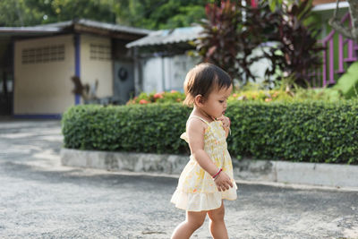 The little girls in their house were walking happily,healthy child concept.