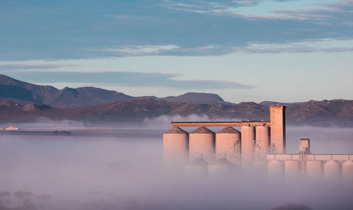 Bridge over river against sky