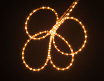 Close-up of illuminated heart shape at night