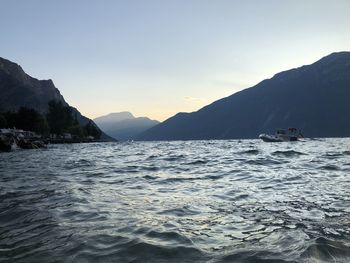 Scenic view of sea against clear sky during sunset