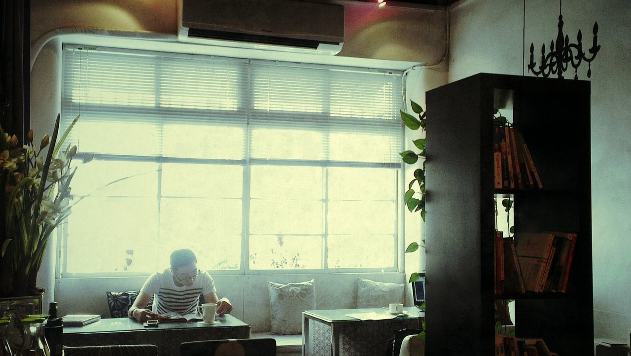 chair, indoors, architecture, built structure, house, absence, table, window, home interior, empty, building exterior, potted plant, furniture, wall - building feature, no people, residential structure, day, seat, domestic room, wall