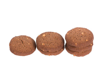Close-up of cookies against white background