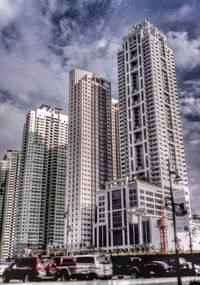 Buildings in city against sky