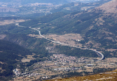 High angle view of road amidst land