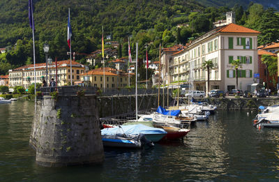 Boats moored at lake como