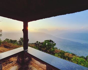 Scenic view of mountain against sky during sunset