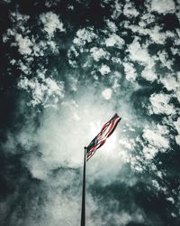 Low angle view of flag against sky