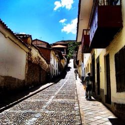 Narrow alley along buildings