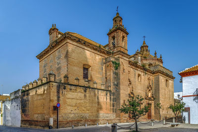 Low angle view of building against blue sky