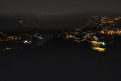 Aerial view of illuminated cityscape