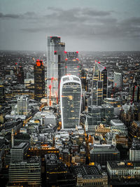 High angle view of buildings in city against sky