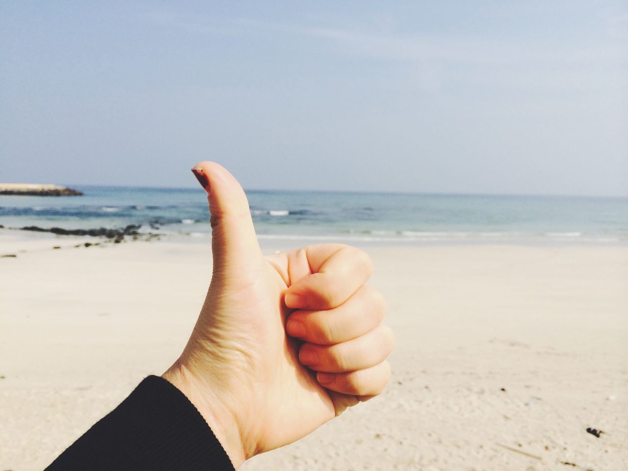 beach, sea, horizon over water, sand, shore, person, water, personal perspective, part of, clear sky, barefoot, copy space, cropped, nature, sky, beauty in nature